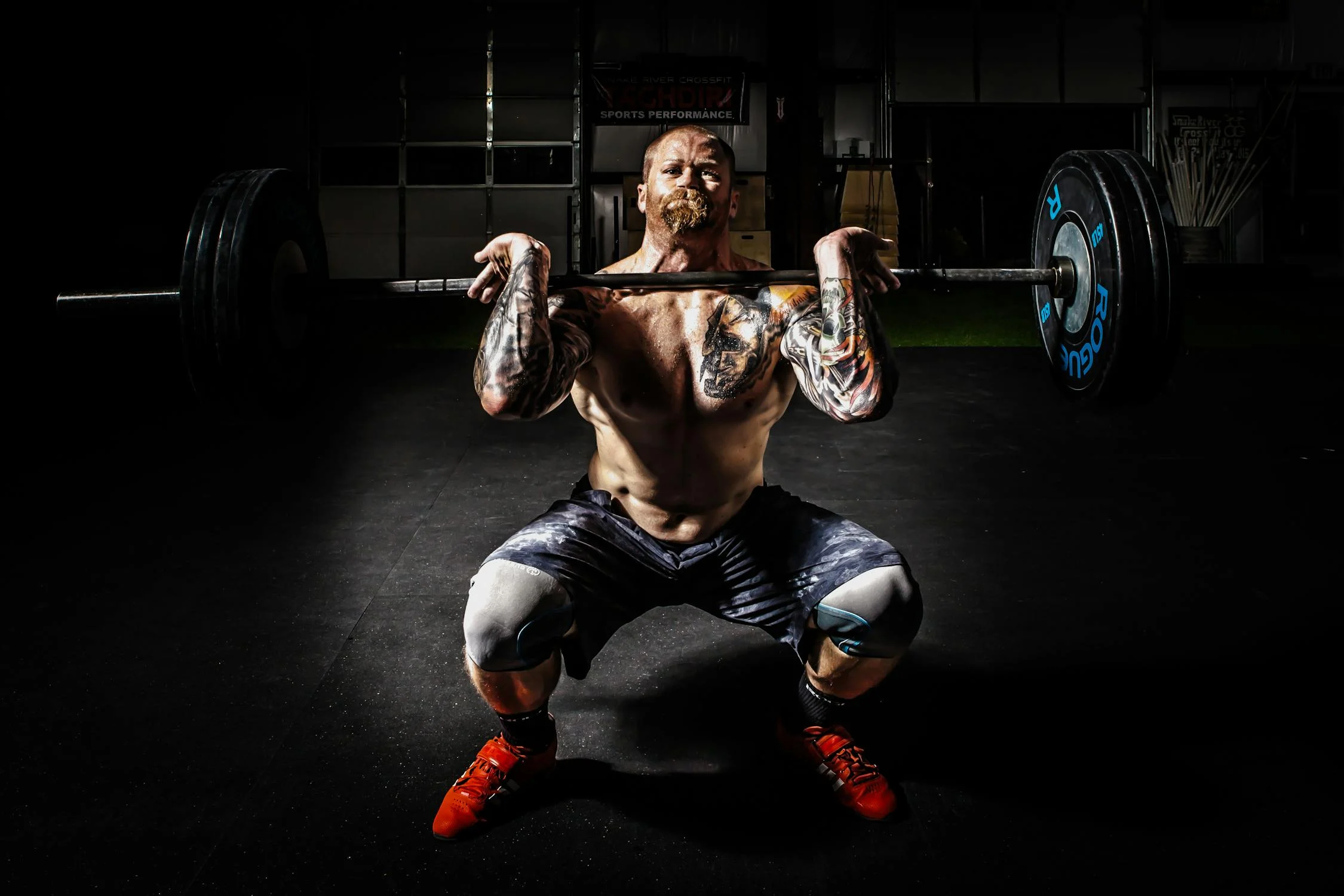guy doing heavy squats